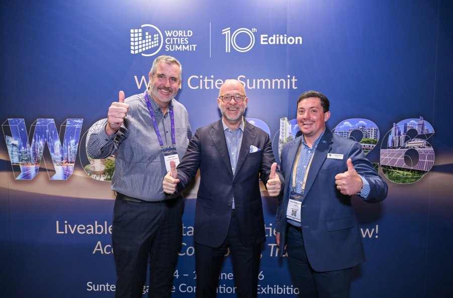 Production team celebrating with attendees at World Cities Summit 2026